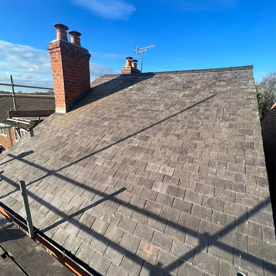 dark grey roof with chimney